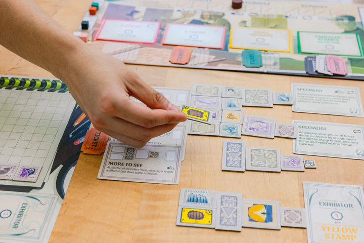 Stonemaier Stamp Swap Board Game Draft and Showcase a Beautiful Stamp Collection Base Game for Adults and Family for 1 to 5 Players Average Playtime 20 to 60 Minutes STM175