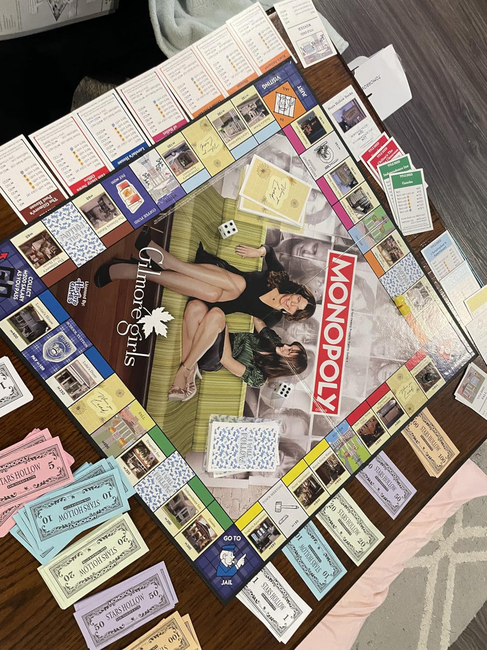 Usaopoly Monopoly Gilmore Girls Edition Board GameBuy, Sell & Trade Iconic Stars Hollow LocationsIncludes 6 Custom Tokens Like Lukeâ€™s Hat & Coffee MugFamily Game Night Fun Official Gilmore Girls Collectible USOMN010628