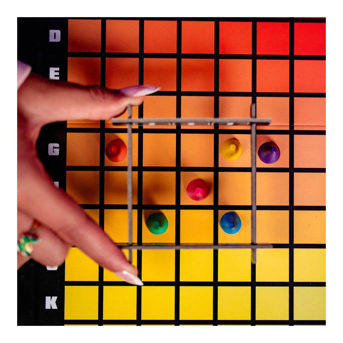 The OP Usaopoly Hues and Cues Board Game Vibrant Color Guessing Game for 3-10 Players USA-PA135-725