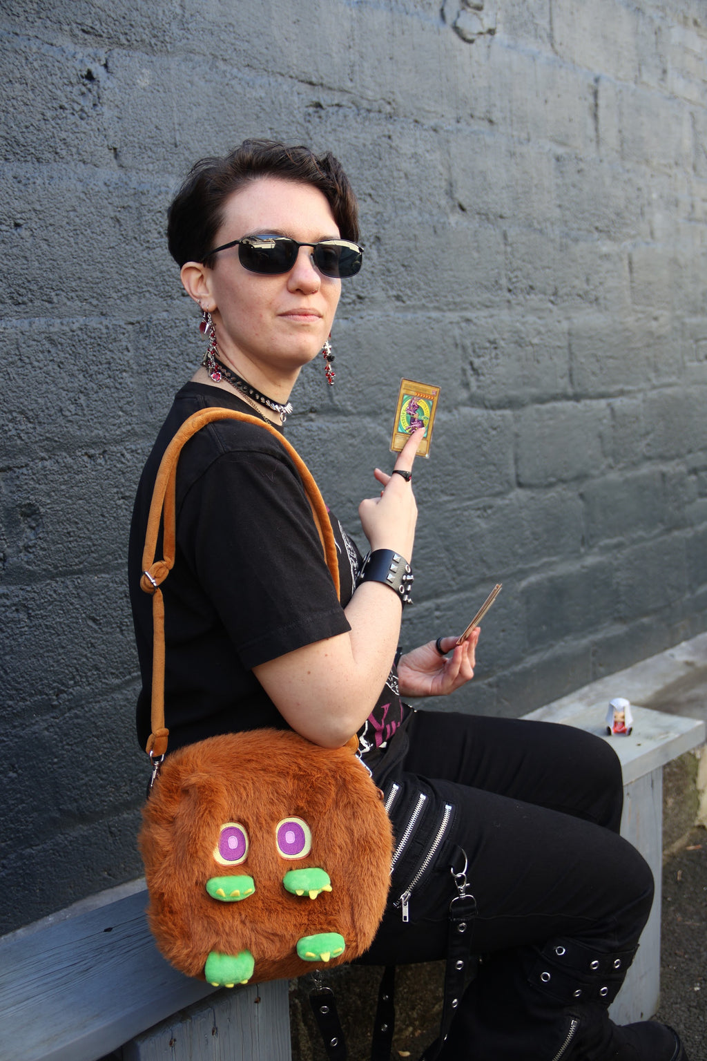 Kuriboh Arty plush sling bag worn crossbody